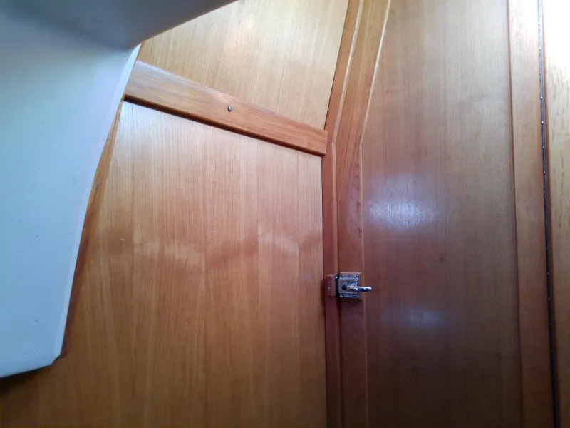 Slide: The Image of Interior wooden paneling of a 1995 Catalina 36 MkII sailboat cabin. - 50