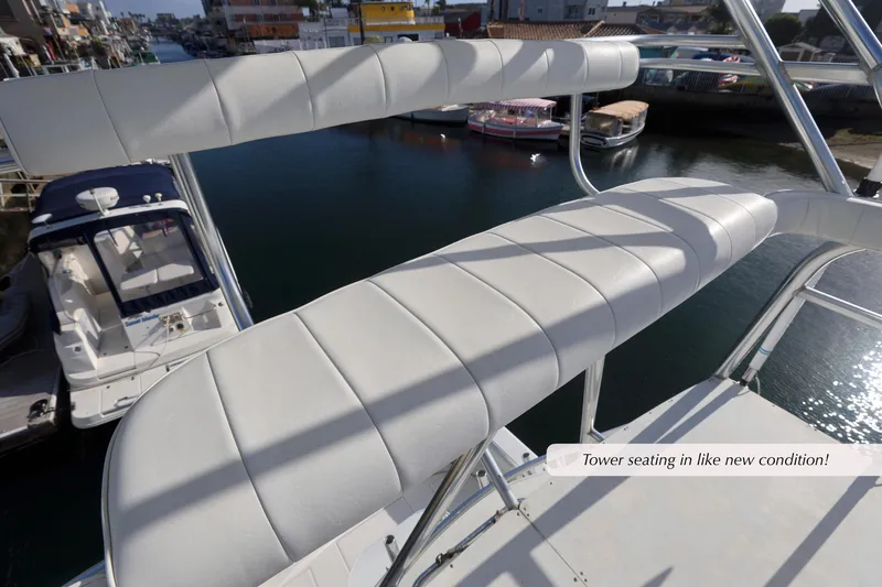 Slide: The Image of Tower seating on 2000 Cabo 35 Express, pristine condition, overlooking marina. - 15
