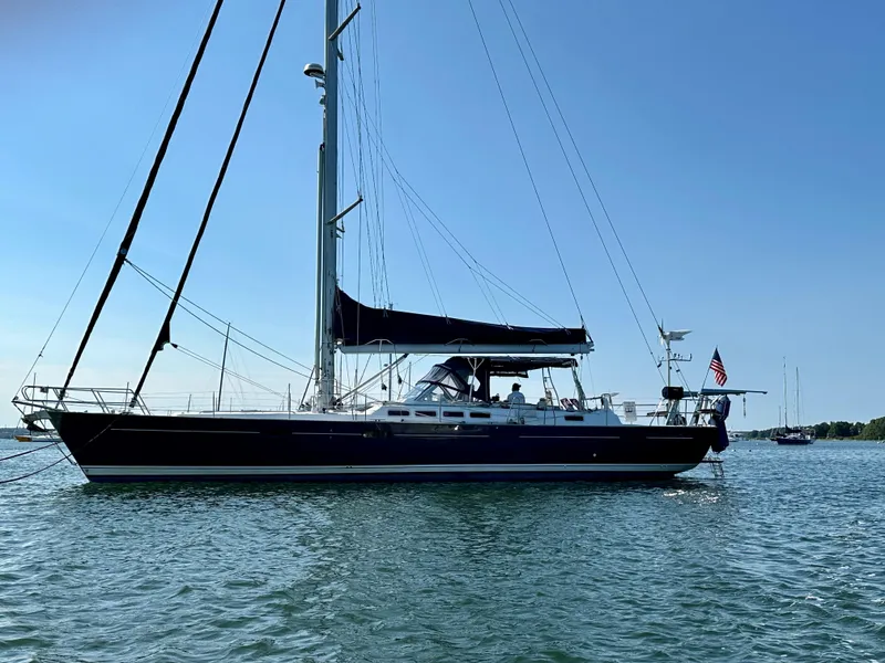 The Image of Sailing yacht on water, 2010 Beneteau 57, clear sky, American flag. - 0