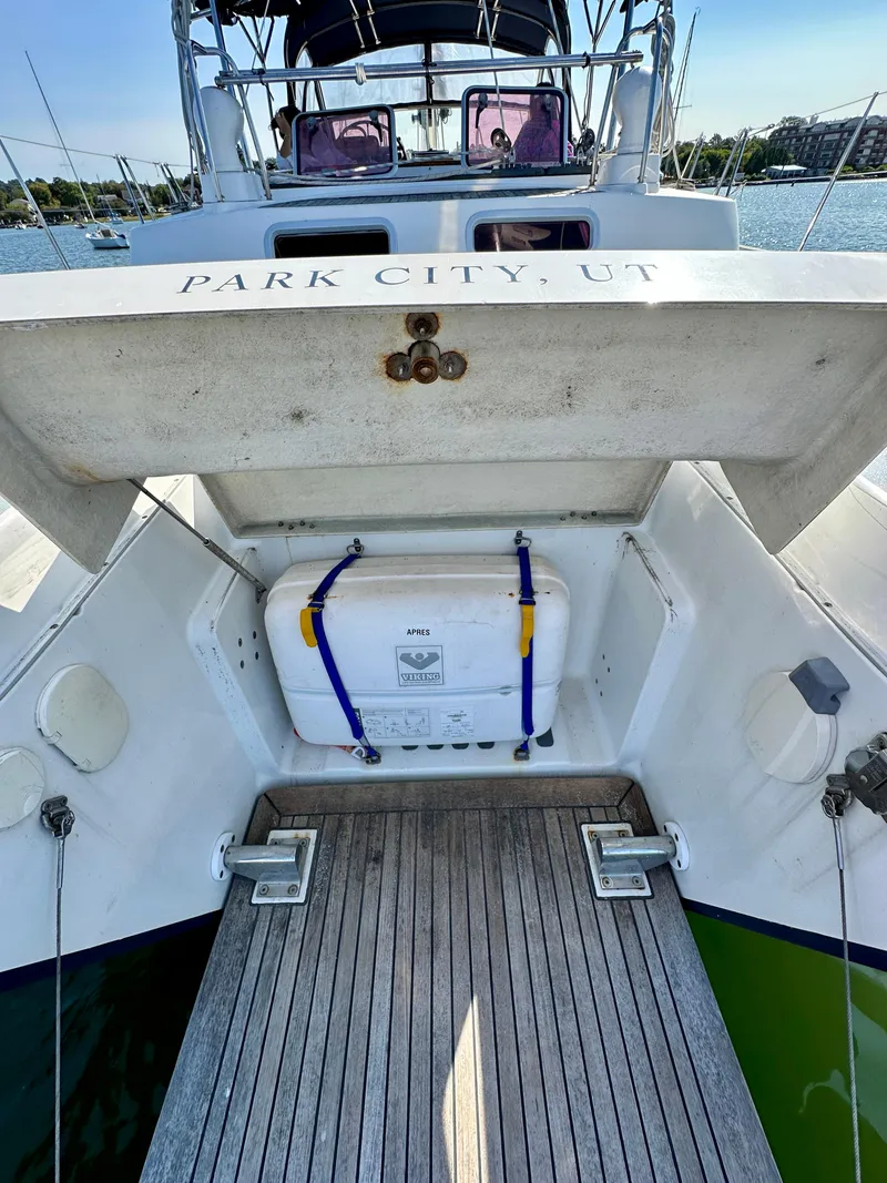 Slide: The Image of Beneteau 57 yacht, 2010 model, docked with open storage compartment, Park City, UT. - 25