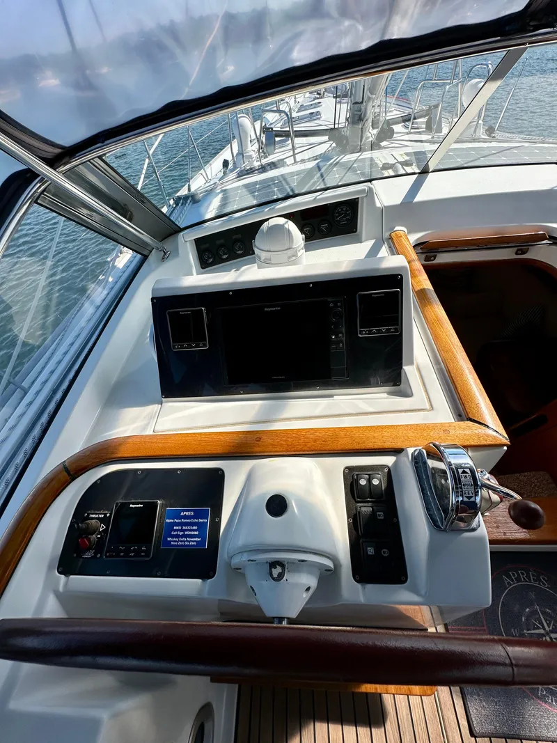 Slide: The Image of Cockpit view of a 2010 Beneteau 57 yacht with navigation equipment. - 29