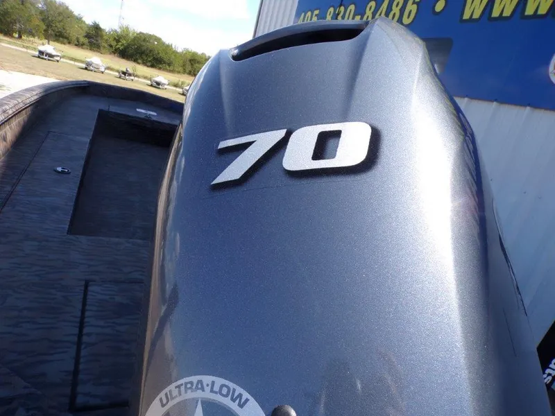 Slide: The Image of 2025 Xpress H18DB boat with 70 horsepower engine, ultra-low emission. - 2