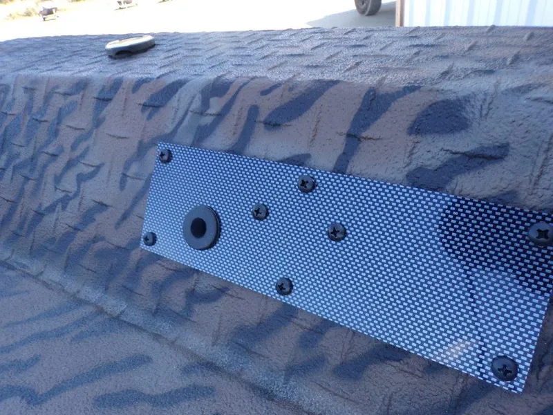 Slide: The Image of Textured surface of 2025 Xpress H18DB boat with mounted panel. - 7