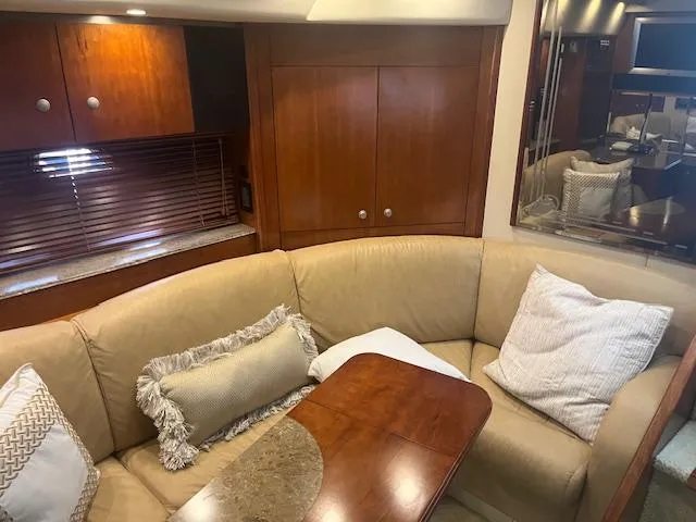 Slide: The Image of Luxurious 2008 Cruisers Yachts 460 Express interior with plush seating and elegant wood finishes. - 11