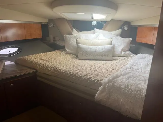 Slide: The Image of Luxurious cabin interior of 2008 Cruisers Yachts 460 Express with plush bedding. - 25