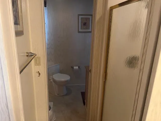 Slide: The Image of Bathroom interior of 2000 Sharpe 16X80 houseboat with shower and toilet. - 11