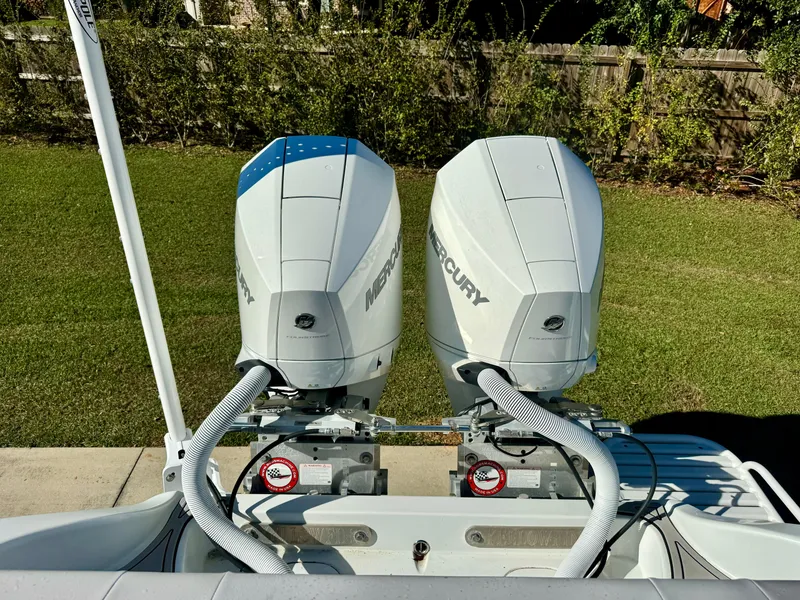 Slide: The Image of 2020 Yellowfin 26 Hybrid boat with dual Mercury outboard engines. - 11