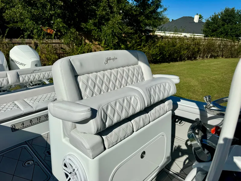 Slide: The Image of 2020 Yellowfin 26 Hybrid boat with luxurious seating and modern design. - 13