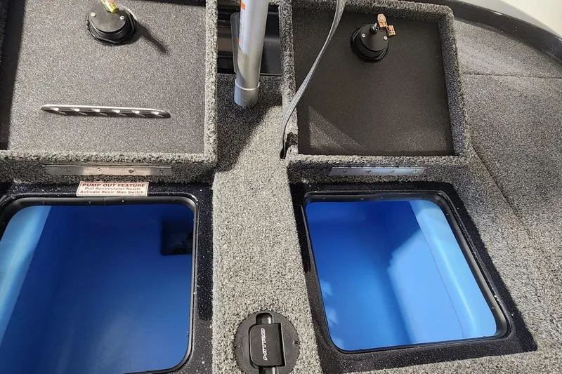 Slide: The Image of Interior compartments of a 2025 Nitro Z19 boat, featuring storage and pump-out features. - 15