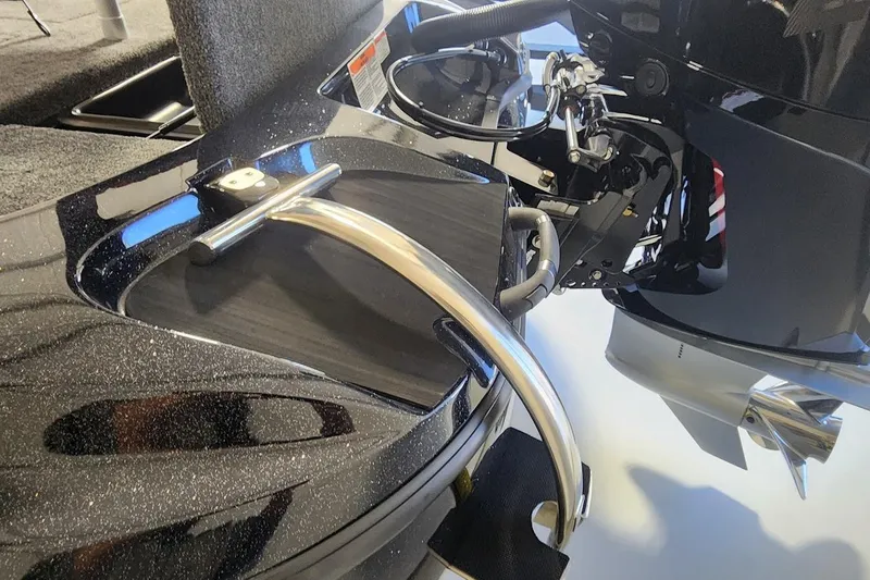 Slide: The Image of 2025 Nitro Z19 boat with sleek metallic finish and modern engine components. - 18