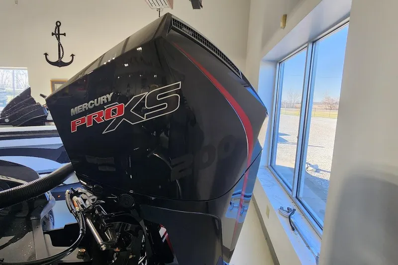Slide: The Image of Mercury Pro XS engine on a 2025 Nitro Z19 boat, indoors near a window. - 5