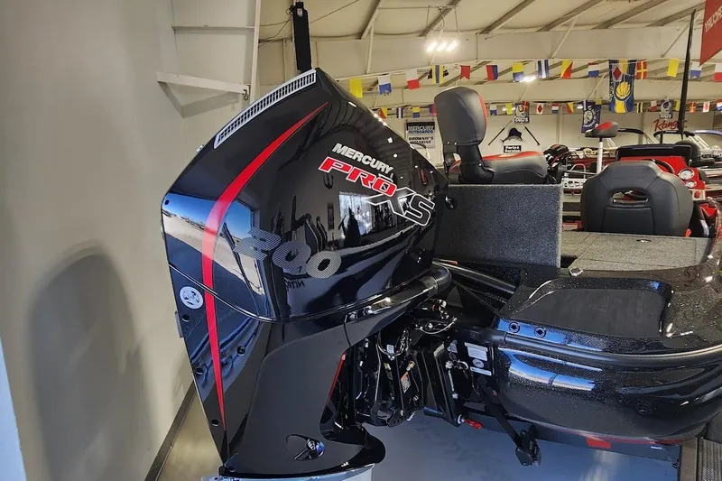 Slide: The Image of 2025 Nitro Z19 boat with Mercury Pro XS engine in showroom. - 6