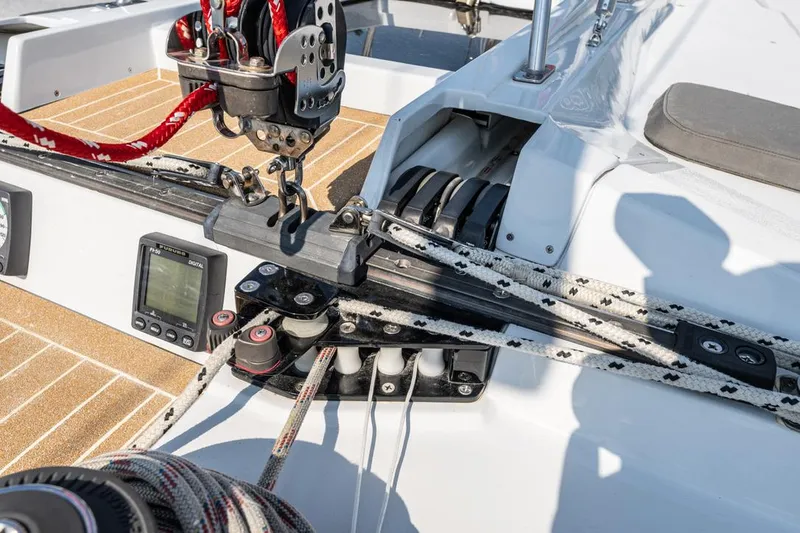 Slide: The Image of Close-up of a 1977 Baltic 42 sailboat deck with rigging and navigation equipment. - 12