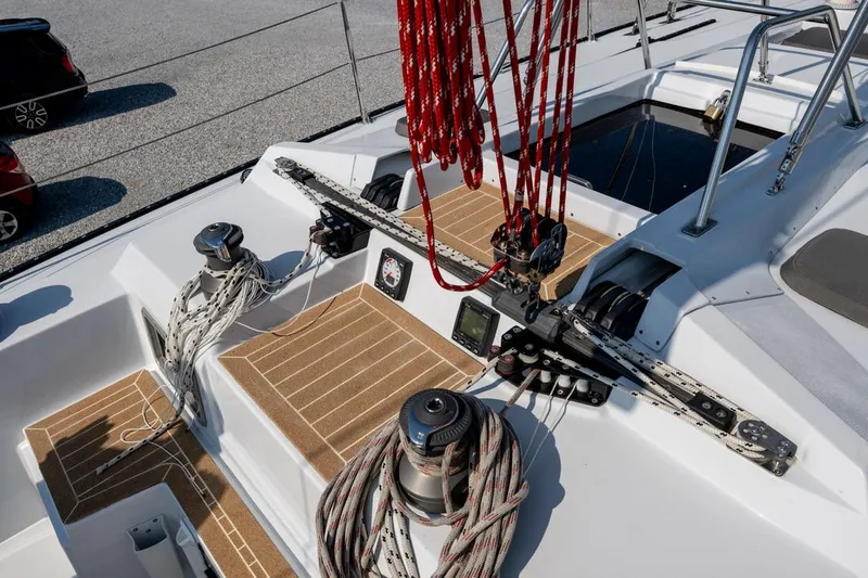 Slide: The Image of Deck of 1977 Baltic 42 sailboat with ropes and winches. - 13