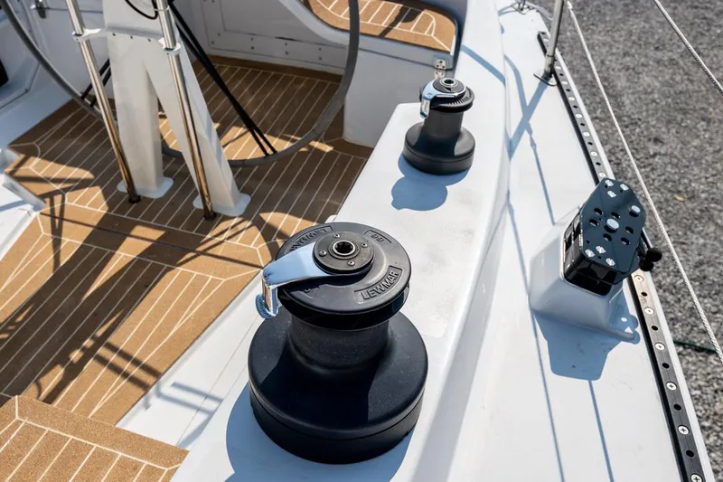 Slide: The Image of Deck of 1977 Baltic 42 sailboat with winches and teak flooring. - 5