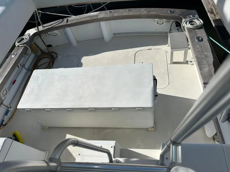 Slide: The Image of 1989 Post 43 boat deck with storage box and seating area. - 4