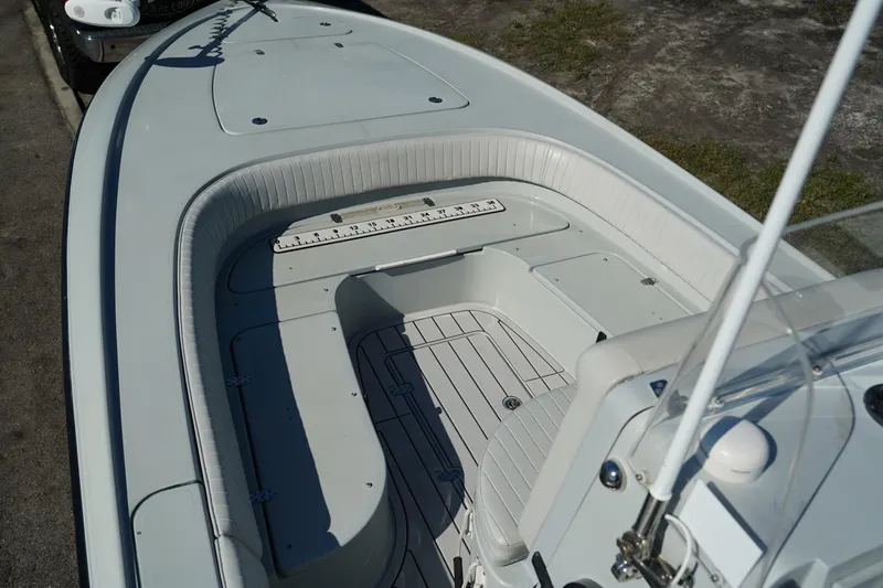Slide: The Image of 2016 Contender 25 Bay boat interior with spacious seating and clean deck design. - 10