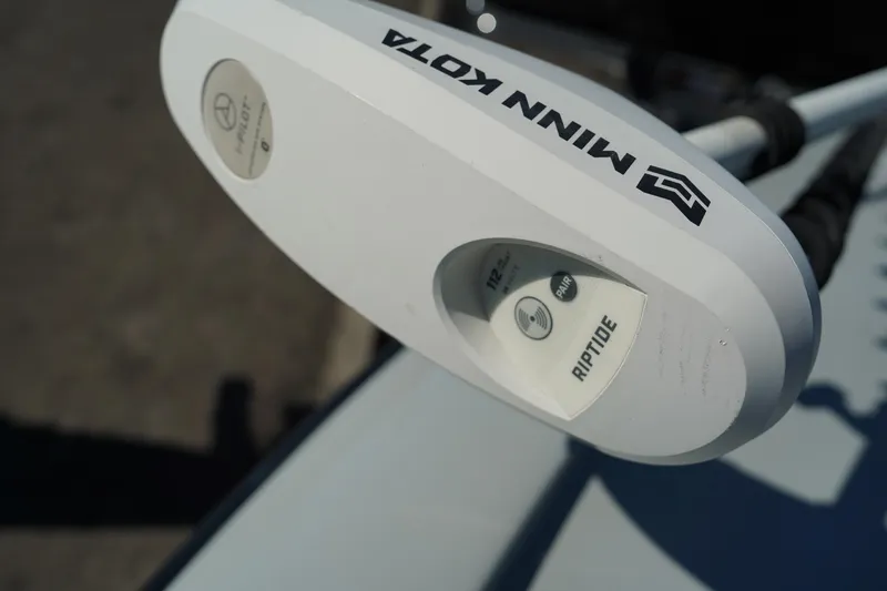 Slide: The Image of Minn Kota Riptide trolling motor on 2016 Contender 25 Bay boat. - 14