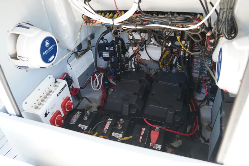 Slide: The Image of 2016 Contender 25 Bay boat electrical system with batteries and wiring. - 17