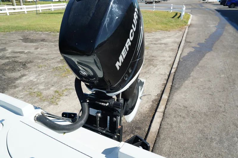 Slide: The Image of 2016 Contender 25 Bay boat with Mercury outboard motor. - 37