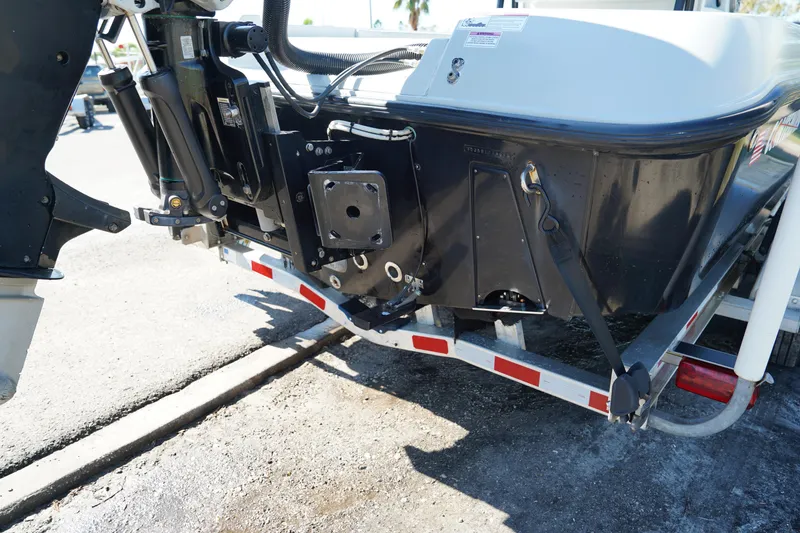 Slide: The Image of 2016 Contender 25 Bay boat on trailer, rear view showing engine mount. - 40