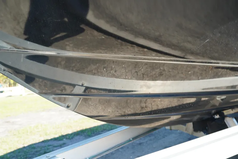 Slide: The Image of Close-up of 2016 Contender 25 Bay boat hull on trailer. - 43