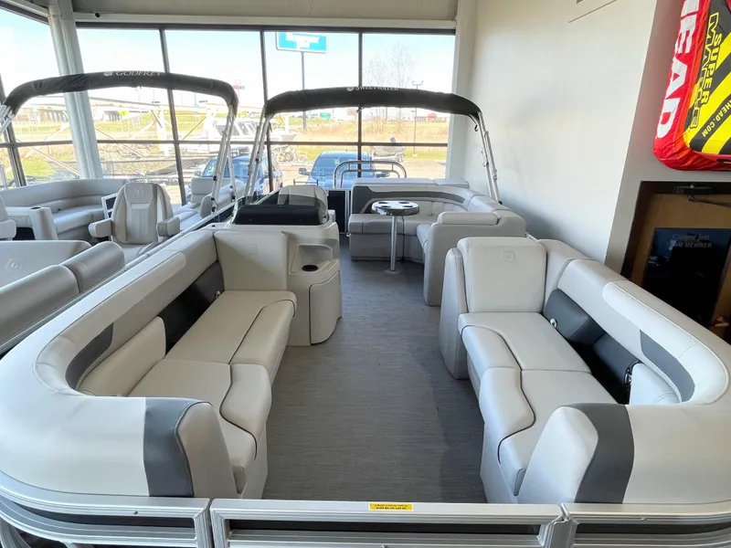 Slide: The Image of 2025 Godfrey Sweetwater 2086 C pontoon boat interior with spacious seating and modern design. - 3