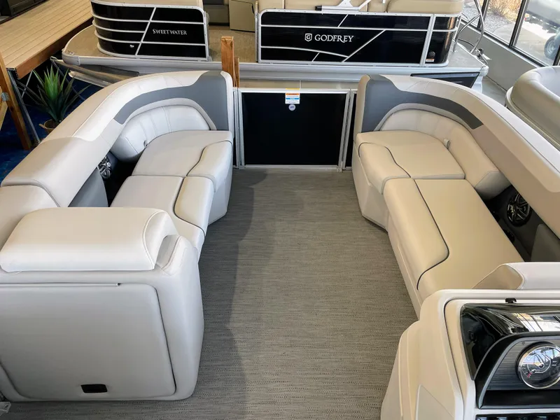 Slide: The Image of Interior of 2025 Godfrey Sweetwater 2086 C pontoon boat with plush seating. - 8