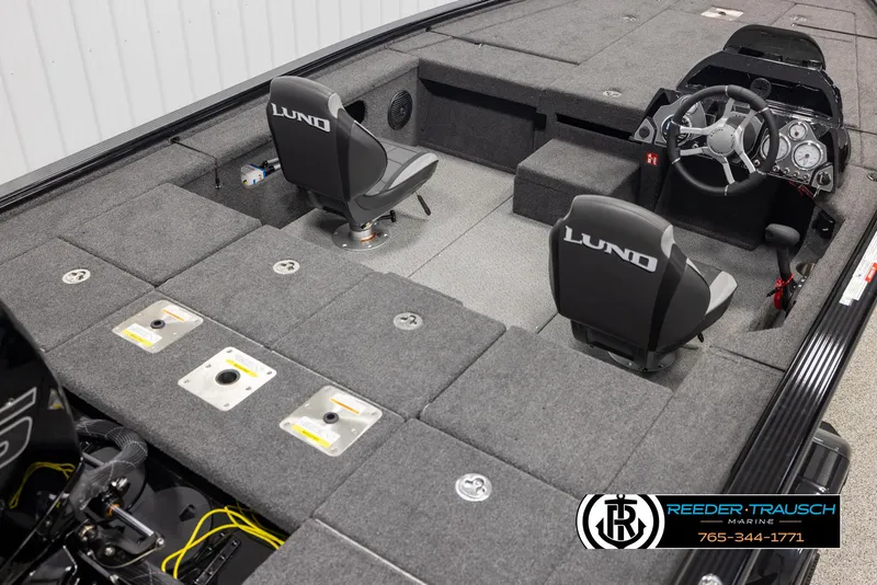 Slide: The Image of 2025 Lund 1875 Pro V Bass XS interior with dual seats and steering console. - 10