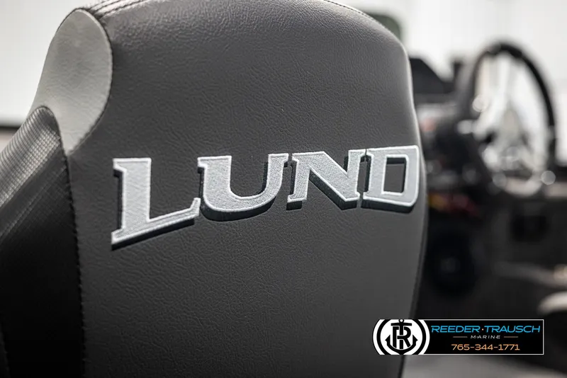 Slide: The Image of 2025 Lund 1875 Pro V Bass XS boat seat with logo, Reeder-Trausch Marine branding. - 28