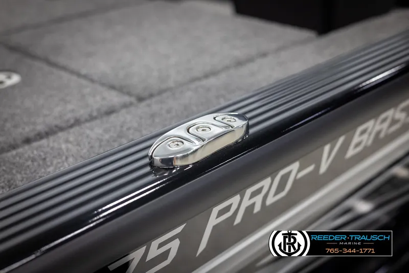 Slide: The Image of 2025 Lund 1875 Pro V Bass XS boat detail with cleat and branding. - 48