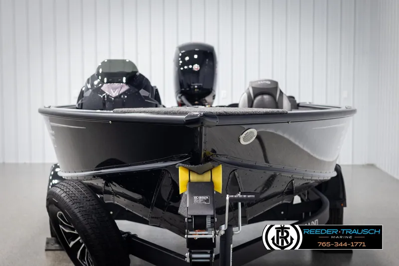 Slide: The Image of 2025 Lund 1875 Pro V Bass XS boat on trailer in showroom. - 6