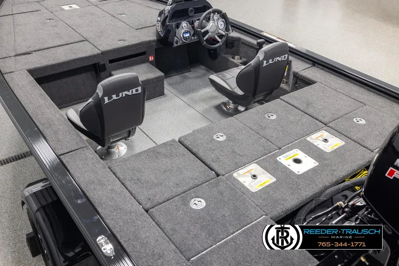Slide: The Image of 2025 Lund 1875 Pro V Bass XS boat interior with dual seats and control console. - 9