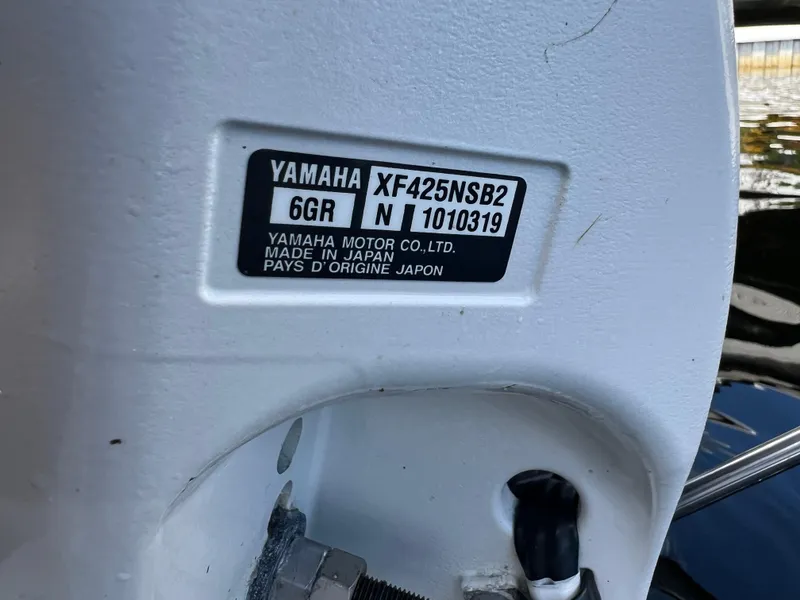 Slide: The Image of Yamaha motor label on 2023 Grady-White 336 Canyon boat, made in Japan. - 101
