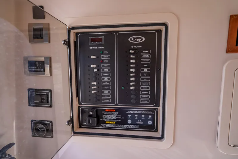 Slide: The Image of Electrical control panel on 2023 Grady-White 336 Canyon boat. - 20