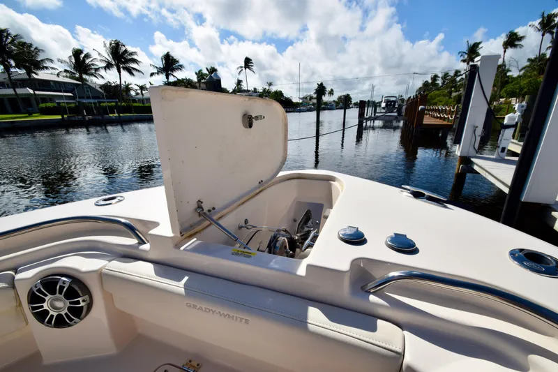 Slide: The Image of 2023 Grady-White 336 Canyon boat at dock, open hatch, sunny day. - 86