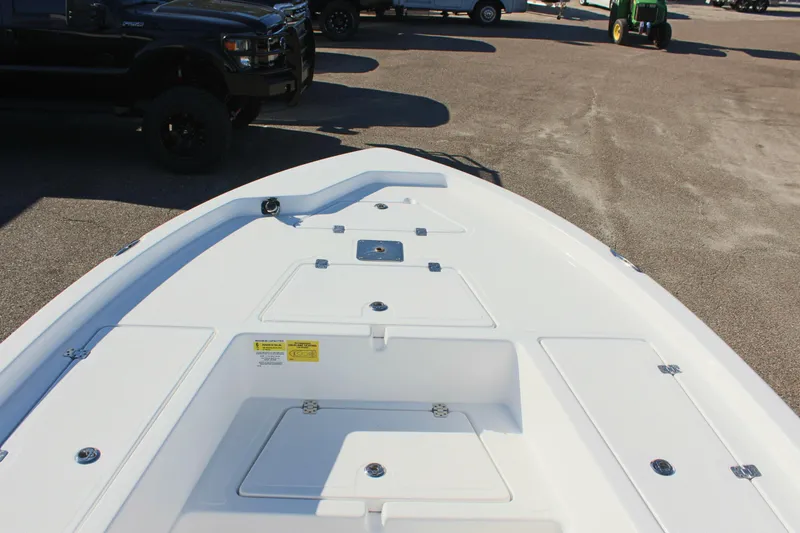 Slide: The Image of 2025 NauticStar 214 Shallow Bay boat deck, white and spacious design. - 20