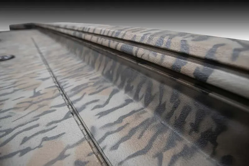 Slide: The Image of 2025 Xpress XP200 Catfish boat with camouflage pattern detail. - 2