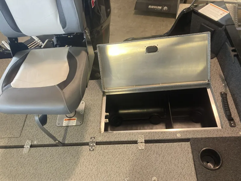 Slide: The Image of Lowe FM 1775 SC boat with open storage compartment and seat, model 2025. - 18