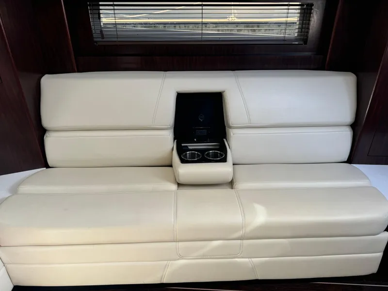 Slide: The Image of Luxurious beige leather seating in 2018 Monterey 335 SY boat interior. - 14