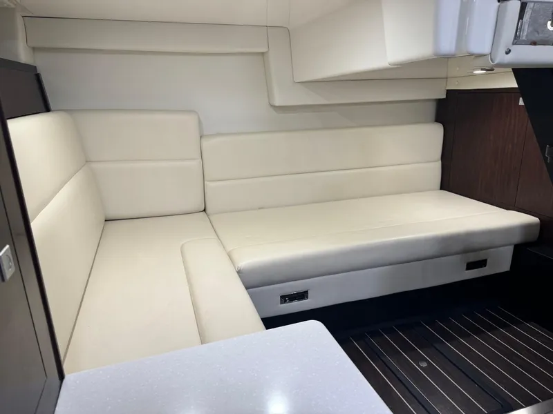 Slide: The Image of 2018 Monterey 335 SY interior with beige seating and modern design. - 15