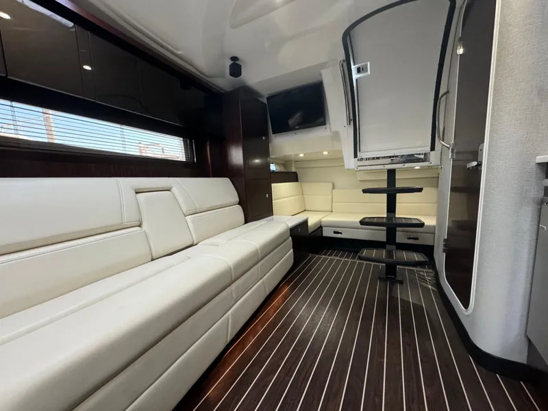 Slide: The Image of Luxurious interior of a 2018 Monterey 335 SY yacht with sleek seating and modern design. - 17