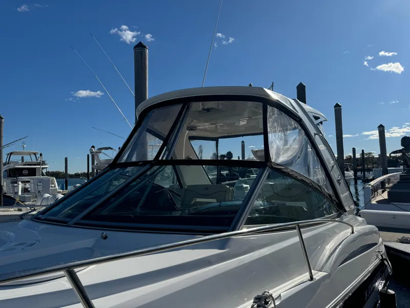Slide: The Image of 2018 Monterey 335 SY boat docked under clear blue sky. - 3