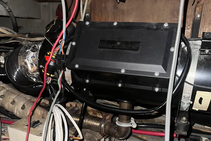 Slide: The Image of Engine compartment of 1974 Hatteras 58 Yachtfish with wiring and components. - 21