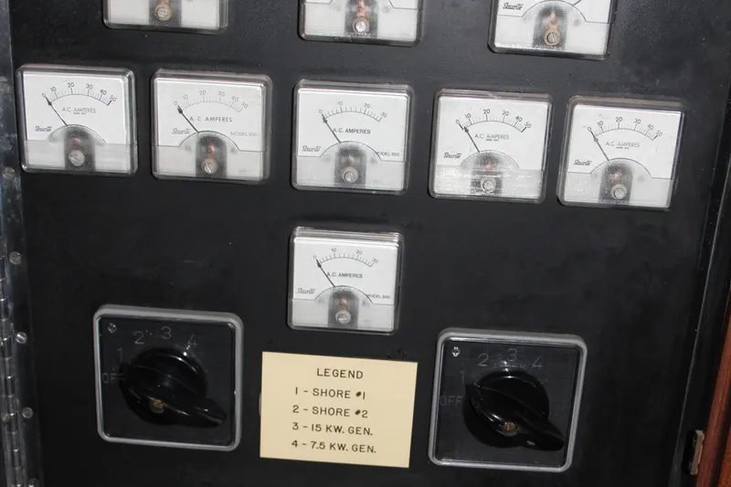 Slide: The Image of Electrical panel with gauges and switches on a 1974 Hatteras 58 Yachtfish. - 32