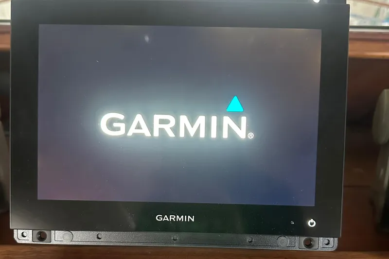 Slide: The Image of Garmin display on 1974 Hatteras 58 Yachtfish dashboard. - 6