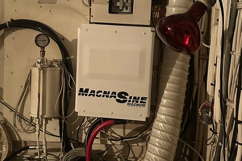 Slide: The Image of MagnaSine inverter in 1974 Hatteras 58 Yachtfish engine room. - 9