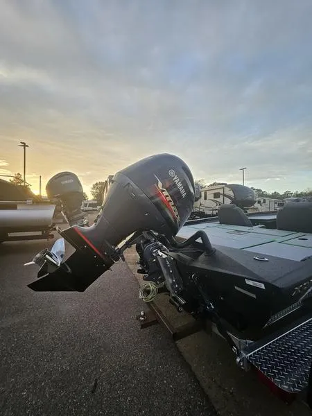 Slide: The Image of 2025 Xpress H20C Crappie boat with Yamaha outboard motor at sunset. - 3
