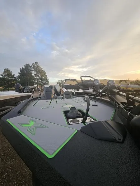 Slide: The Image of 2025 Xpress H20C Crappie boat at sunrise, featuring sleek design and advanced fishing equipment. - 9