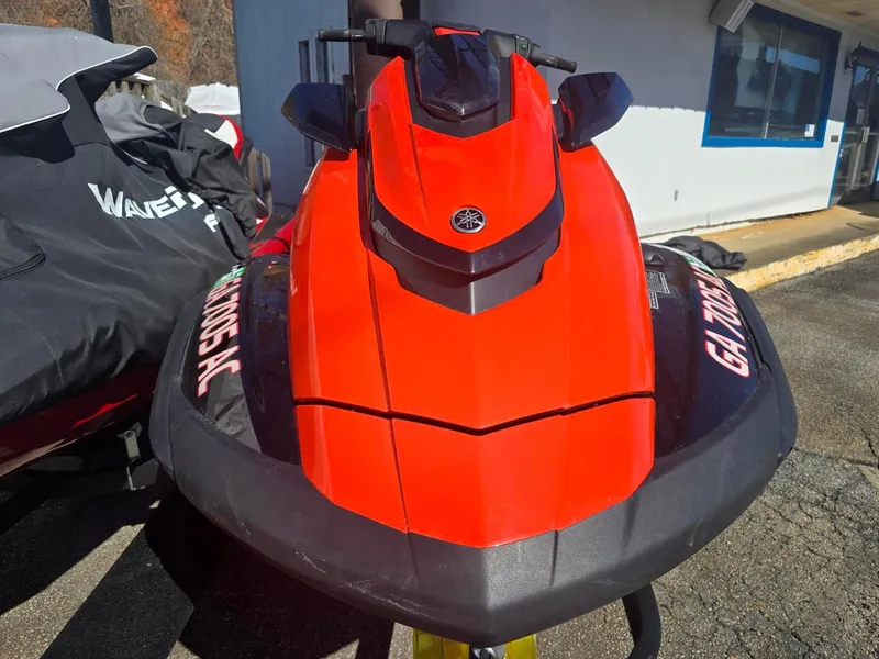Slide: The Image of 2021 Yamaha WaveRunner FX Limited SVHO in vibrant red, parked outdoors. - 4
